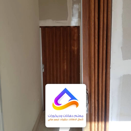 تصليح باب اكورديون الرياض